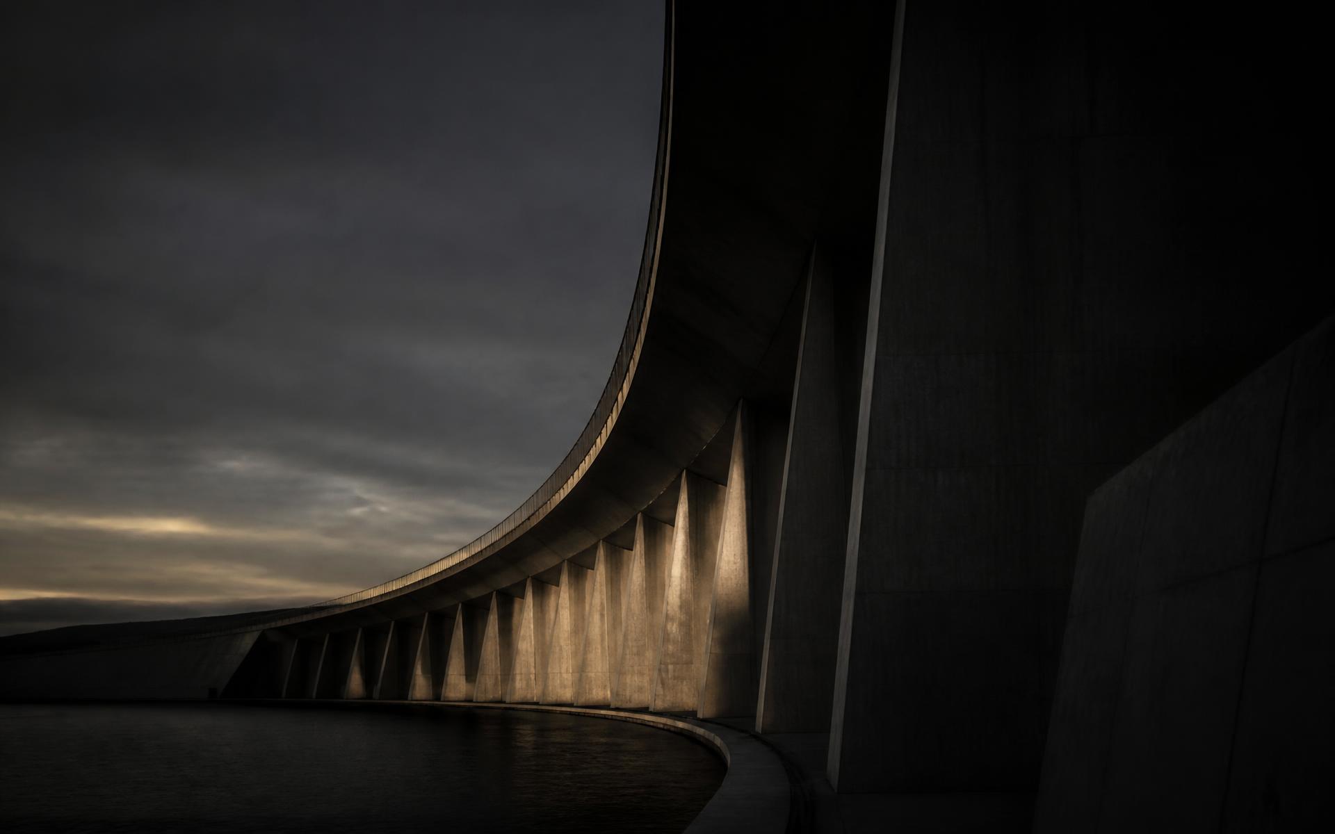 Monumental concrete viaduct at dusk